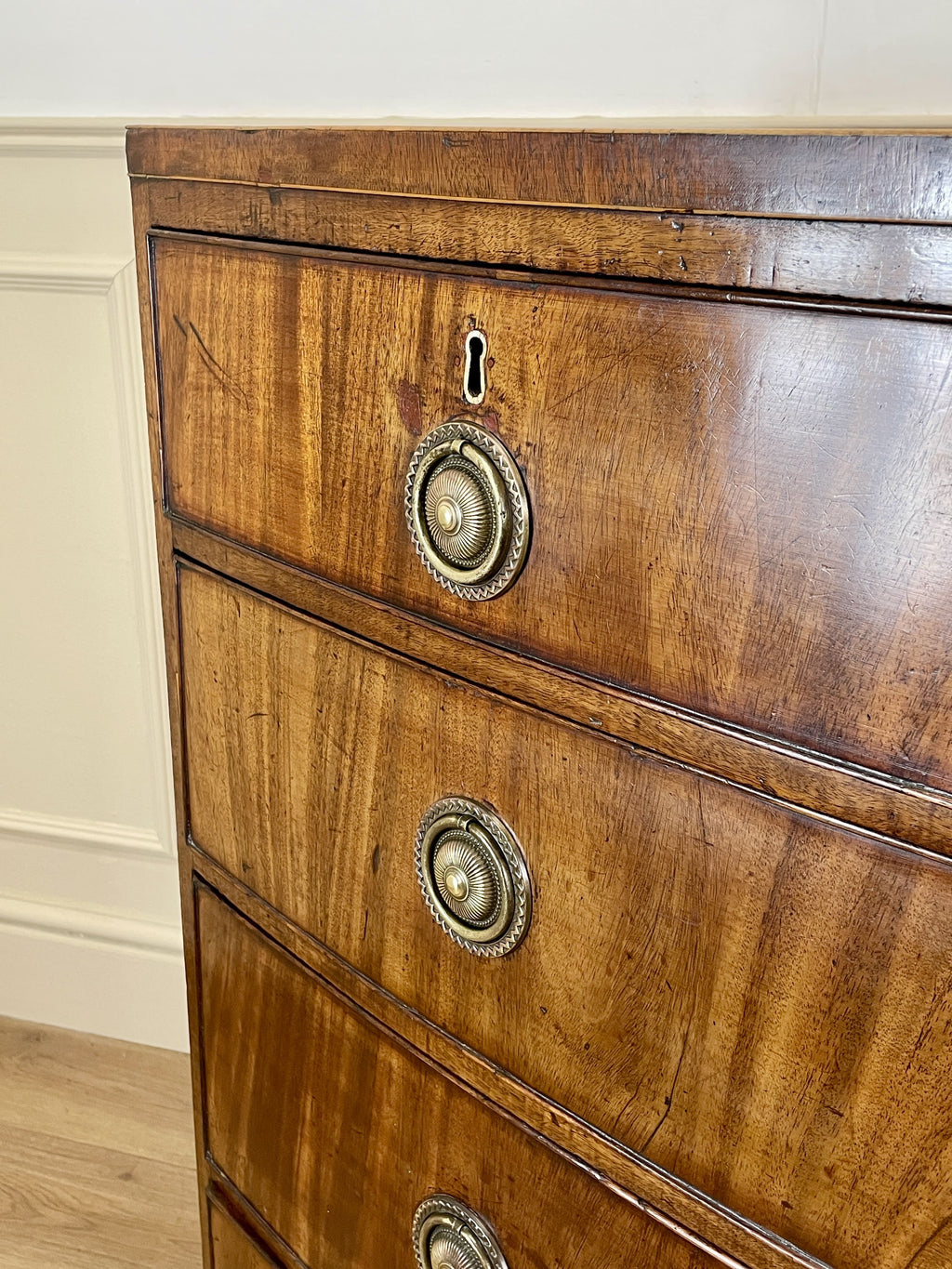 ntique Regency mahogany bowfront chest of drawers with two short over three long drawers, ideal chest of drawers for bedroom in a cottage interior.