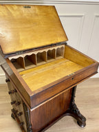 Antique Victorian Burr Walnut Davenport Writing Desk with original dark green leather top, boxwood stringing, side drawers, and turned columns on castors.