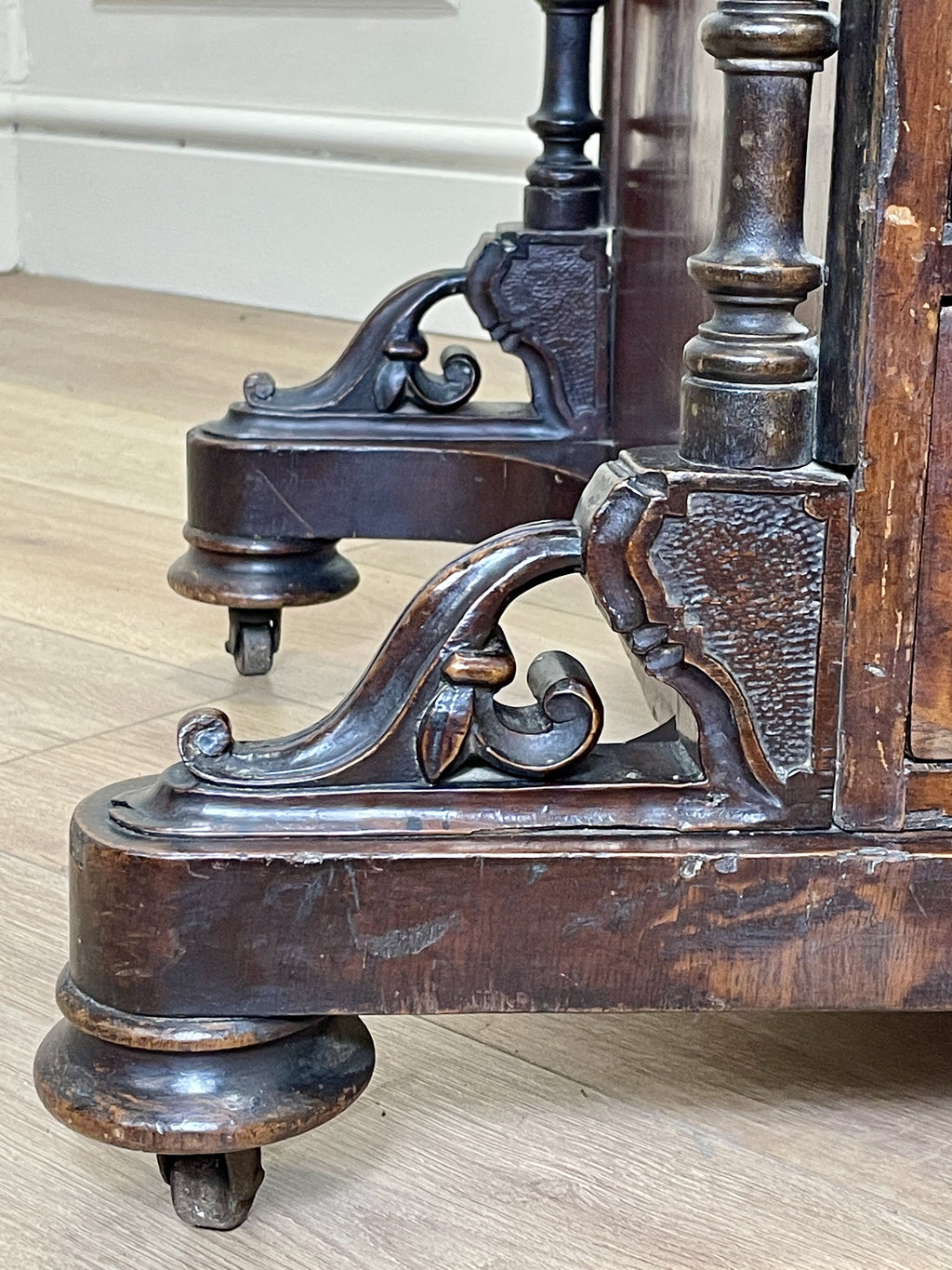 Antique Victorian Burr Walnut Davenport Writing Desk with original dark green leather top, boxwood stringing, side drawers, and turned columns on castors.