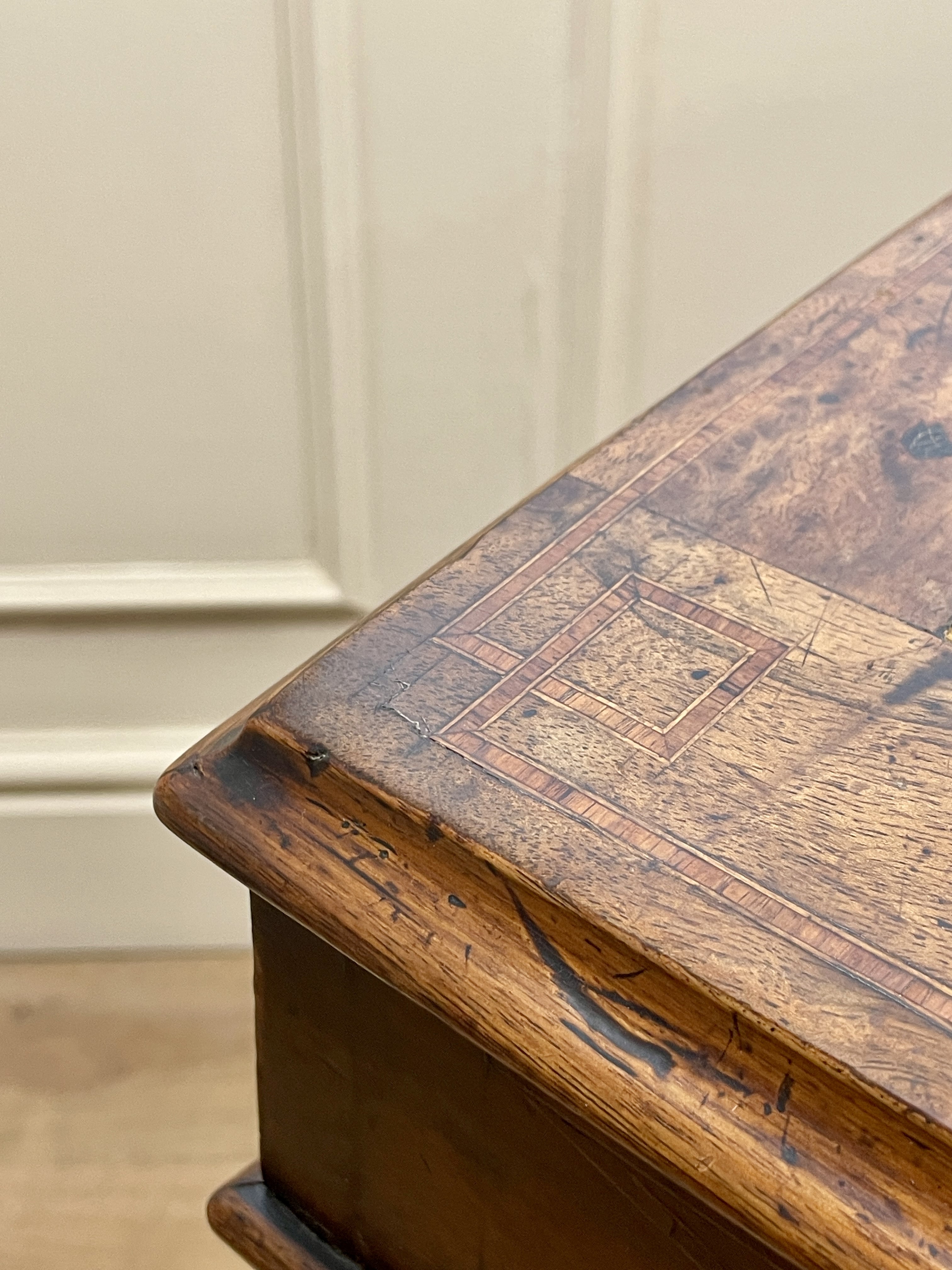 Antique Victorian Burr Walnut Davenport Writing Desk with original dark green leather top, boxwood stringing, side drawers, and turned columns on castors.