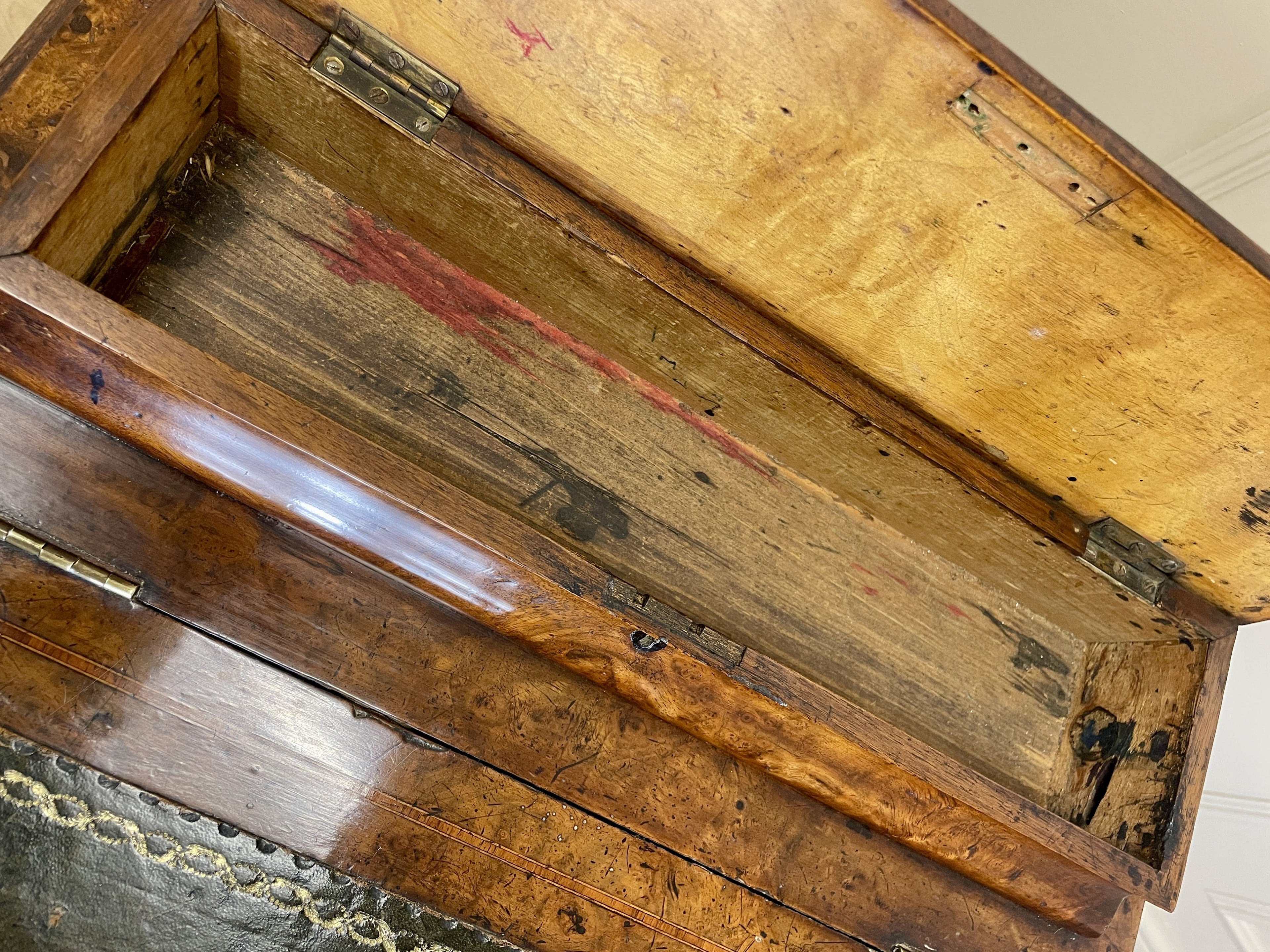 Antique Victorian Burr Walnut Davenport Writing Desk with original dark green leather top, boxwood stringing, side drawers, and turned columns on castors.
