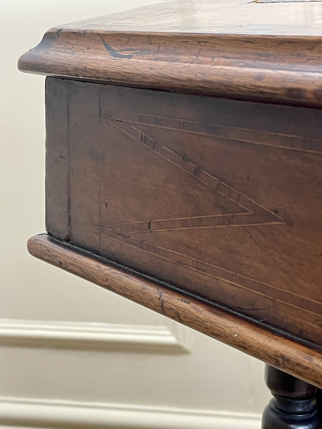 Antique Victorian Burr Walnut Davenport Writing Desk with original dark green leather top, boxwood stringing, side drawers, and turned columns on castors.
