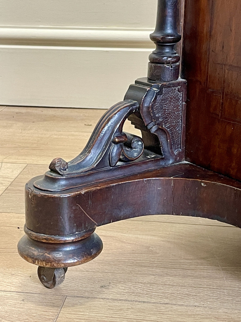 Antique Victorian Burr Walnut Davenport Writing Desk with original dark green leather top, boxwood stringing, side drawers, and turned columns on castors.