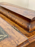 Antique Victorian Burr Walnut Davenport Writing Desk with original dark green leather top, boxwood stringing, side drawers, and turned columns on castors.