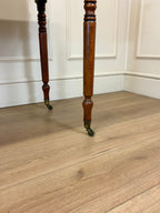 Wooden floor with a piece of furniture partially visible