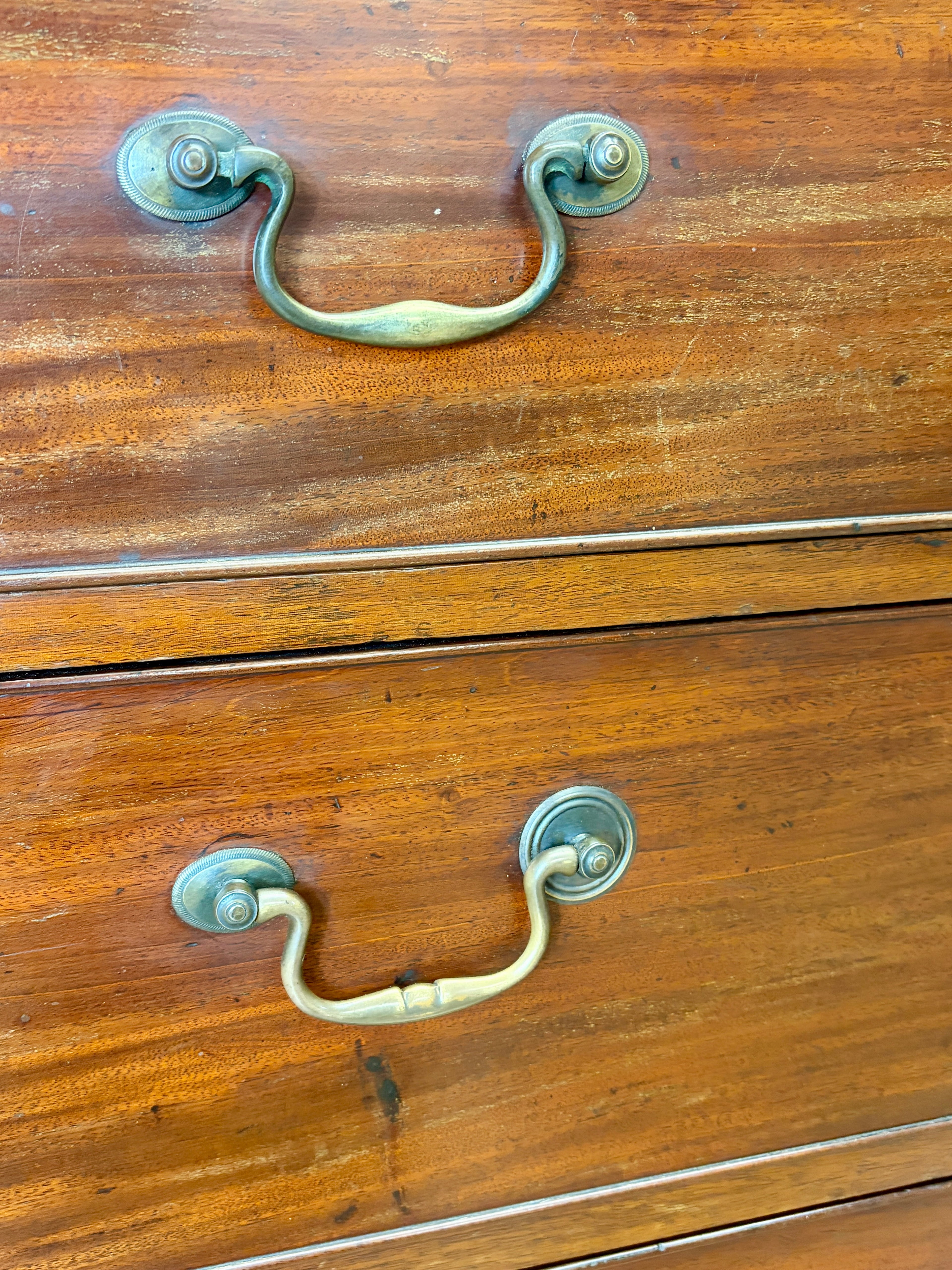 Wooden drawer with brass handles