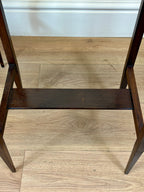Wooden step stool on a wooden floor