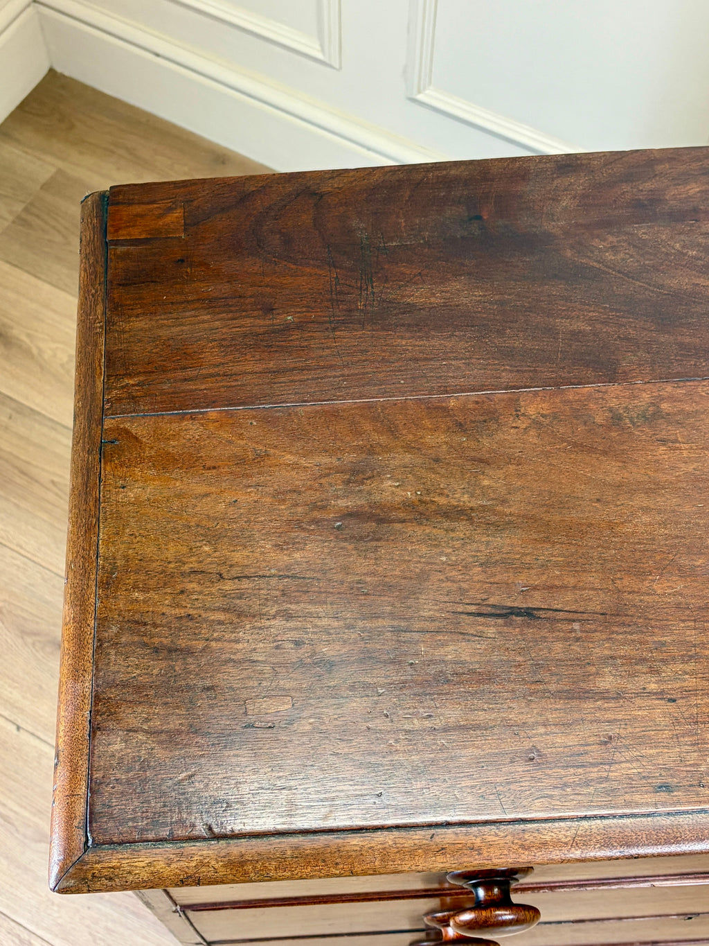 Close-up of a wooden surface with a visible grain pattern