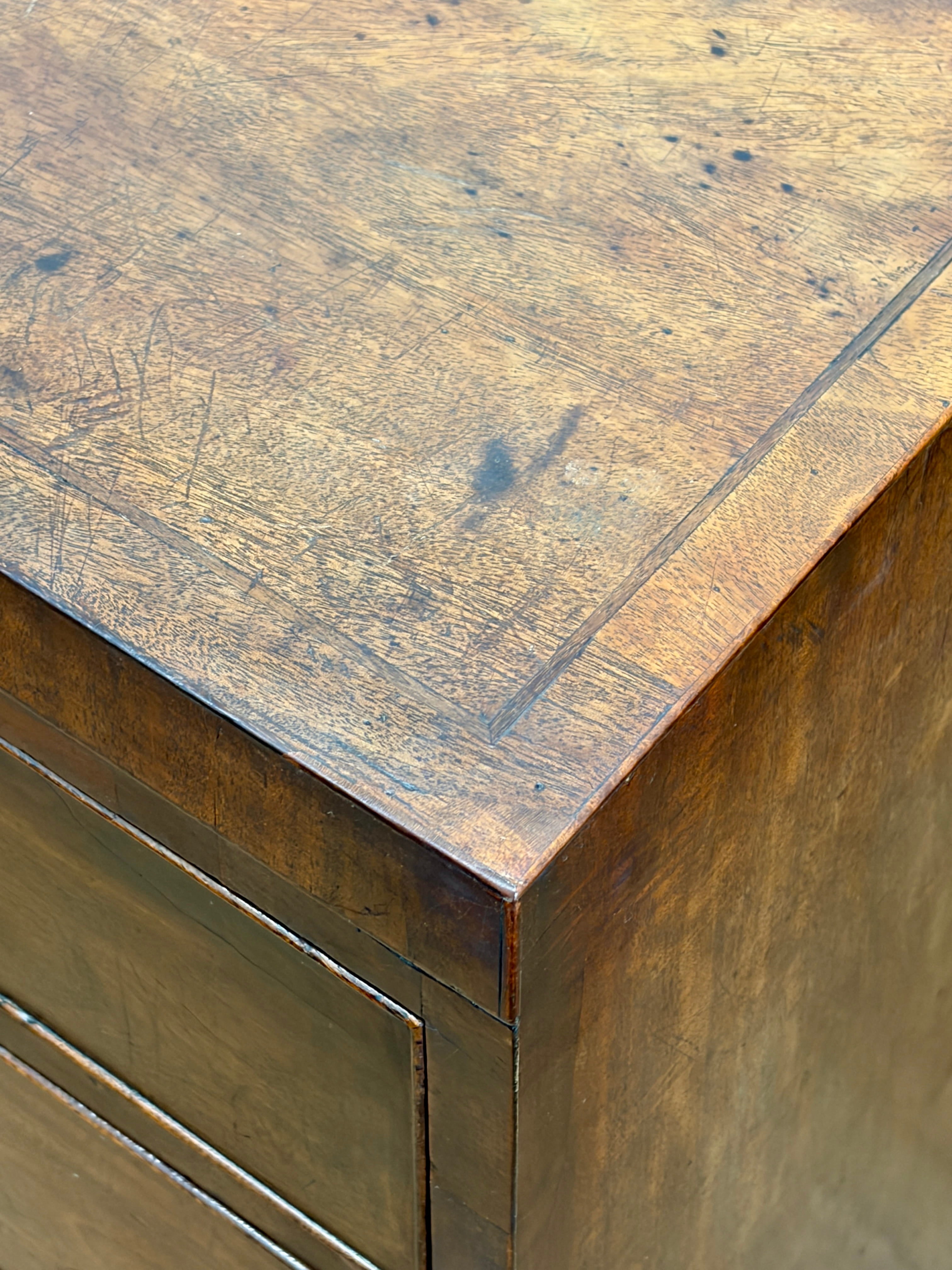 Close-up of a wooden surface with a metal frame